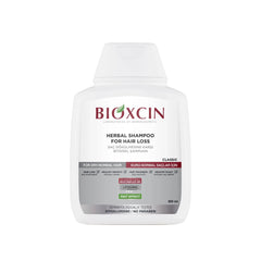 شامبو هيربال كلاسيك للعناية بتساقط الشعر الجاف والعادي 300 مل - بيوكسين Bioxcin