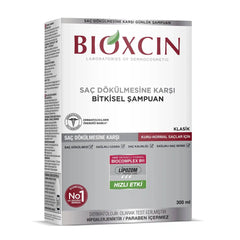 شامبو هيربال كلاسيك للعناية بتساقط الشعر الجاف والعادي 300 مل - بيوكسين Bioxcin